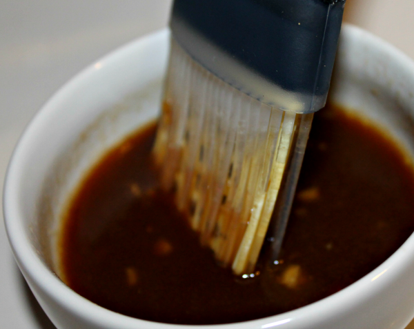 Steakhouse marinade in ramekin with grill brush