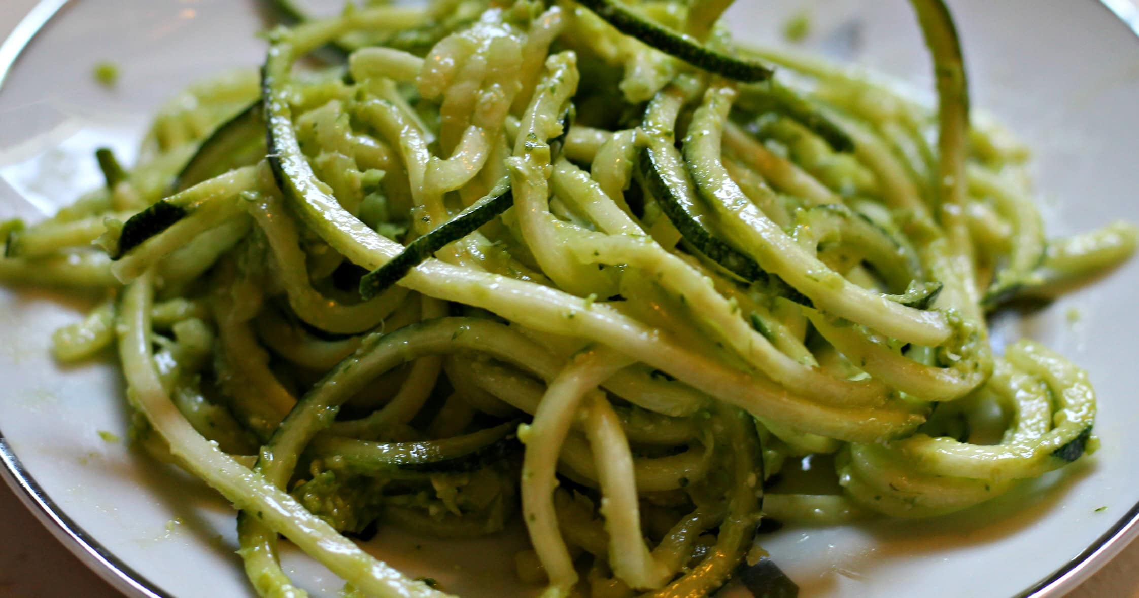 zucchini noodles with garlic scape pesto and basil