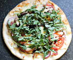 BLT Pizza Recipe - Easy Weeknight Meal. Topped with bacon, arugula, and tomatoes. #pizzarecipeeasy #bltpizza #weeknightmealidea