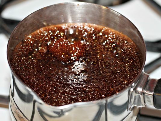 Balsamic vinegar boiling in pan