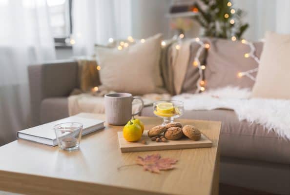 Cozy Living Room with table, couch, and fairy lights
