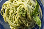 zucchini noodles with garlic scape pesto on a plate