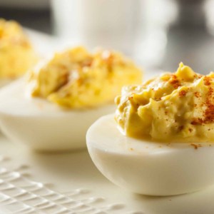 deviled eggs on a white tray