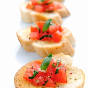 4 baguette slices topped with fresh easy bruschetta