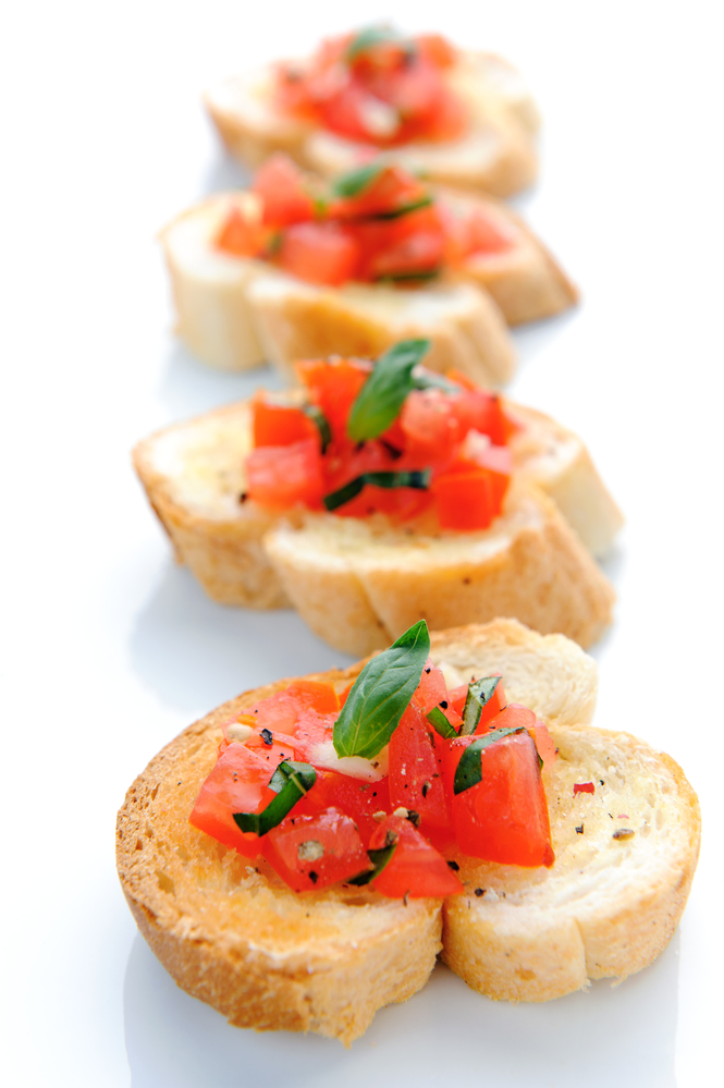 4 baguette slices topped with fresh easy bruschetta