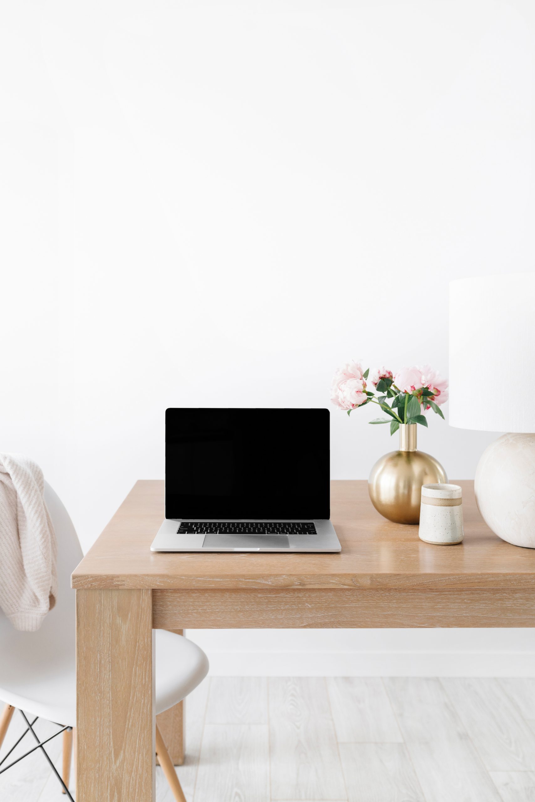 cozy home office with flowers and light