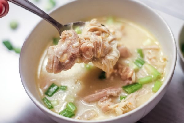close up of chicken soup in a bowl