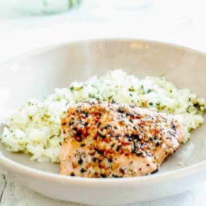 gray bowl with salmon and rice