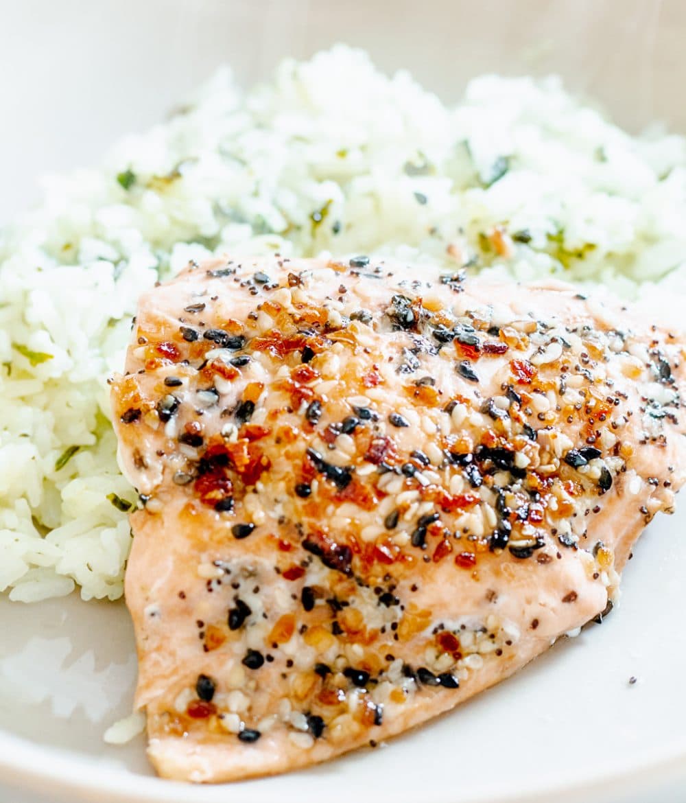 up close photo of everything bagel baked salmon and rice