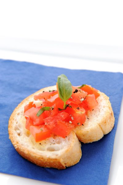 Italian brushetta; sliced baguette topped with a mixture of chopped tomato, garlic and basil