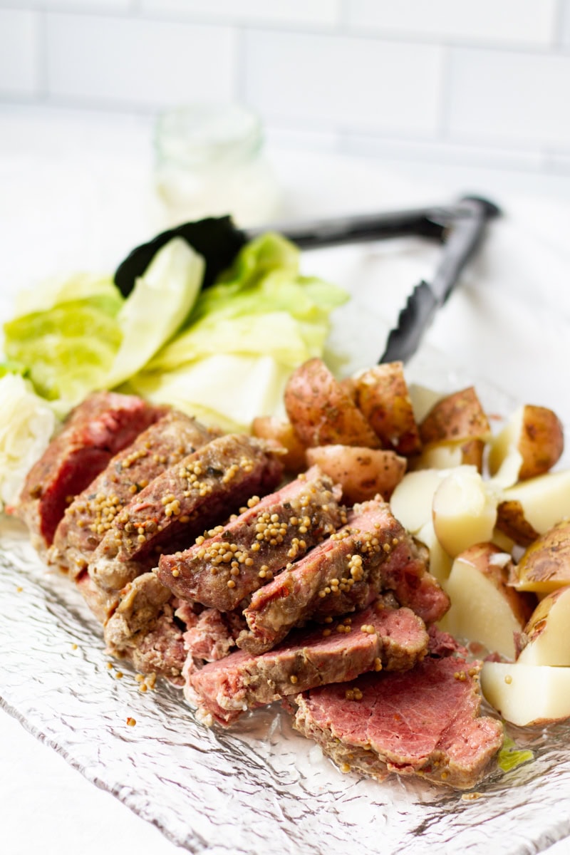 platter of corned beef, cabbage, and potatoes