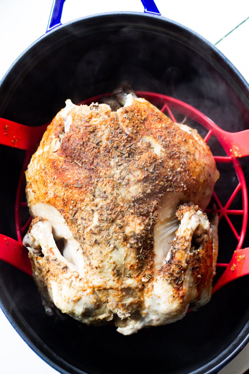 cooked whole chicken inside an instant pot sling