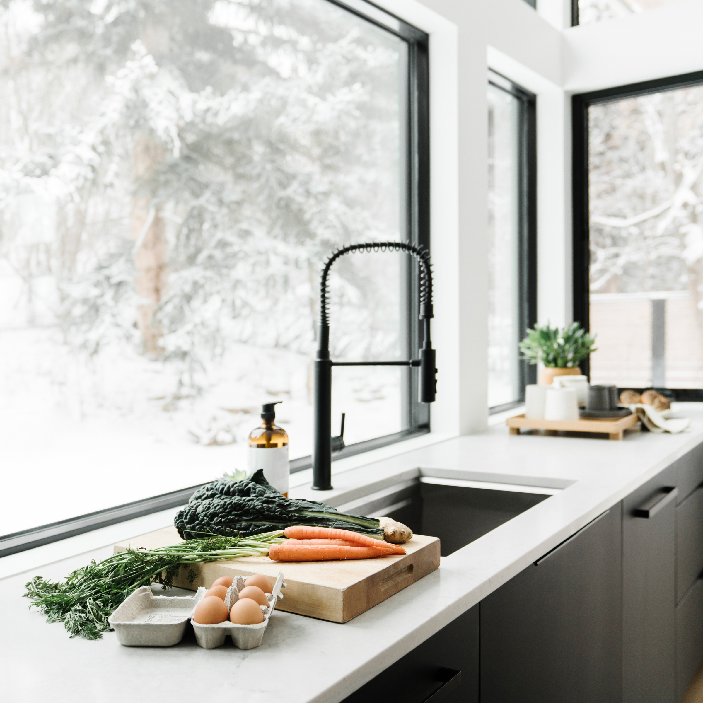 eggs, veggies, and decor on a kitchen counter for cozy meal preparation