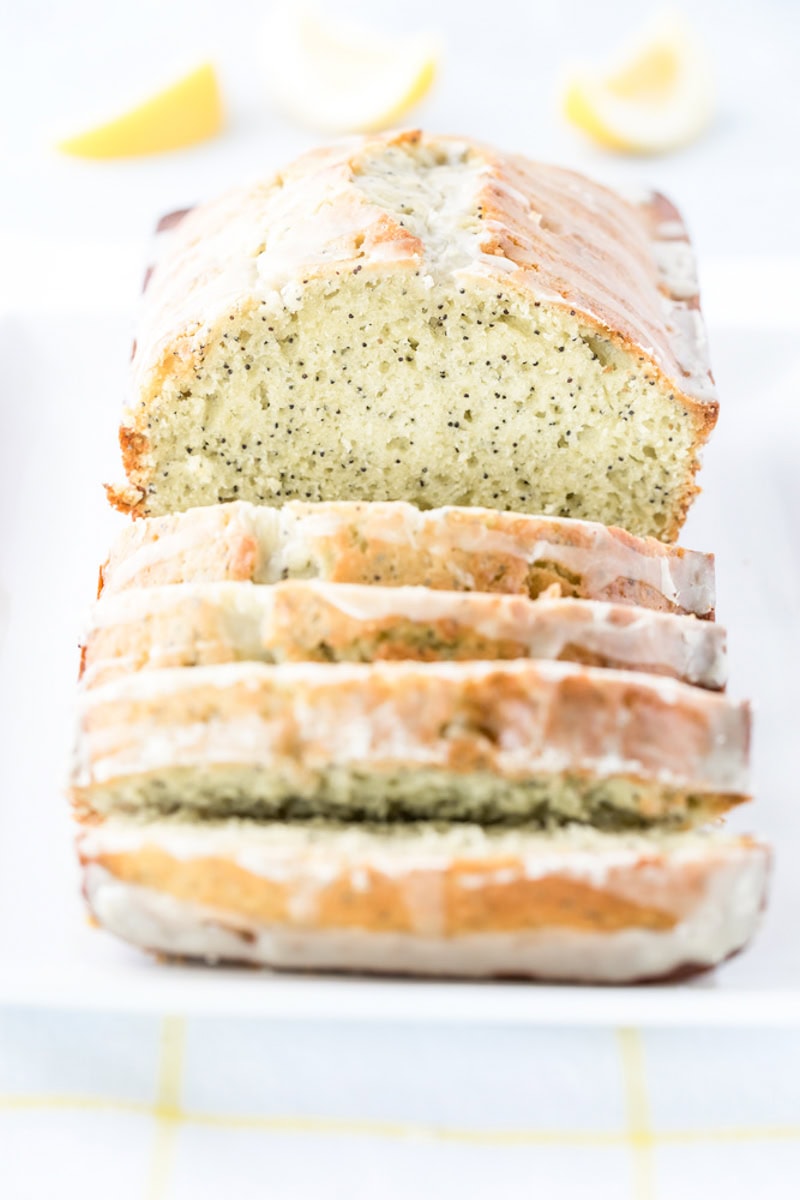 half sliced loaf of lemon poppy seed bread