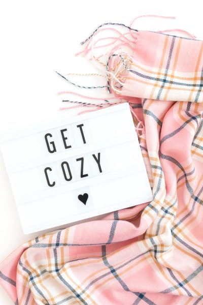 hygge blanket scarf and "get cozy" sign