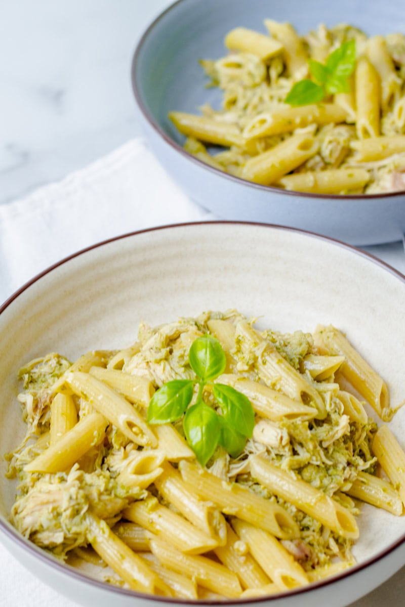 two bowls of chicken basil pesto pasta