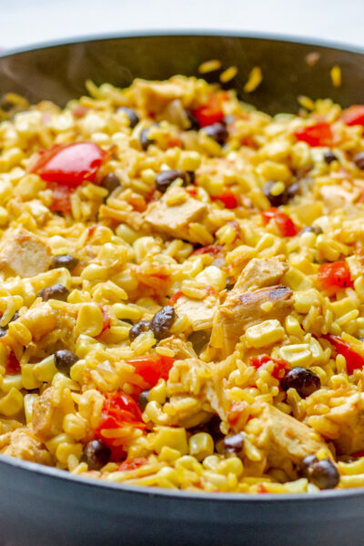Close up of One Skillet Southwest chicken and rice bowl in a black skillet