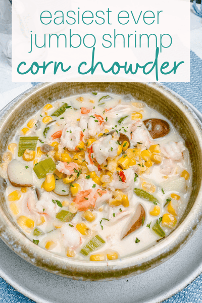 bowl of shrimp corn chowder with potatoes on a placemat