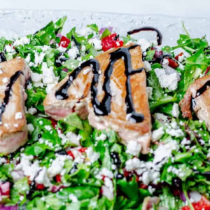 seared ahi tuna on a bed of chopped salad