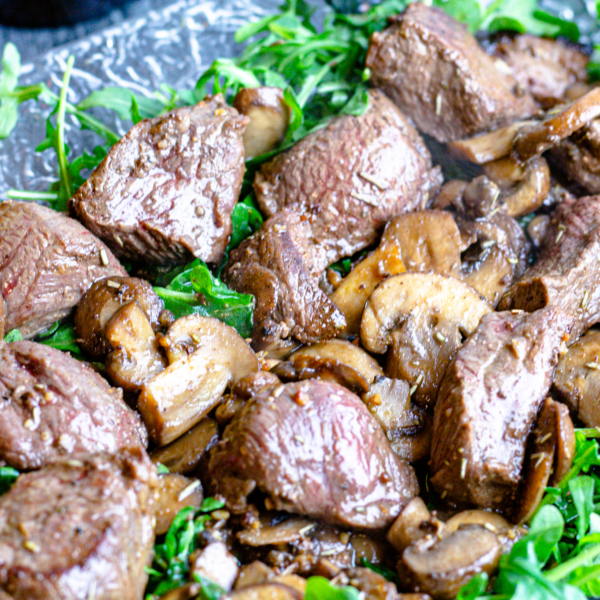 AMAZING Beef Tenderloin Steak Tips, Zip Sauce, Mushrooms, & Arugula
