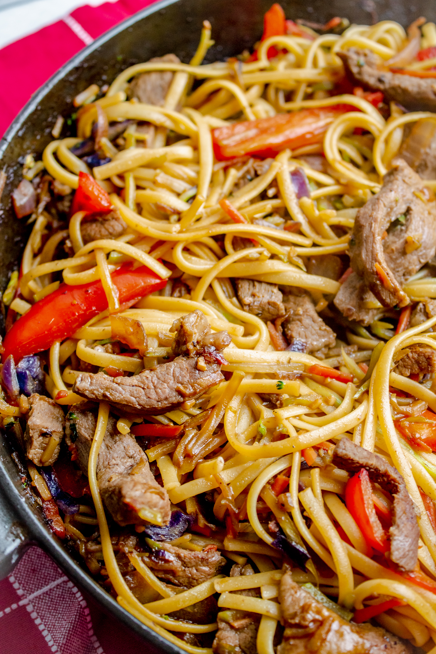 close up of a pan filled with Asian Inspired Beef and Noodles