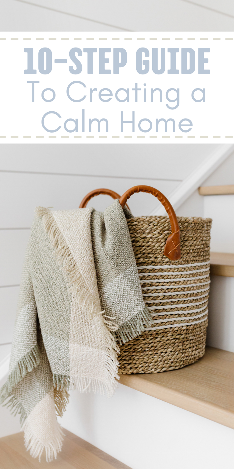 wicker basket on a step wit a blanket inside and text overlay "10-step guide to creating a calm home"