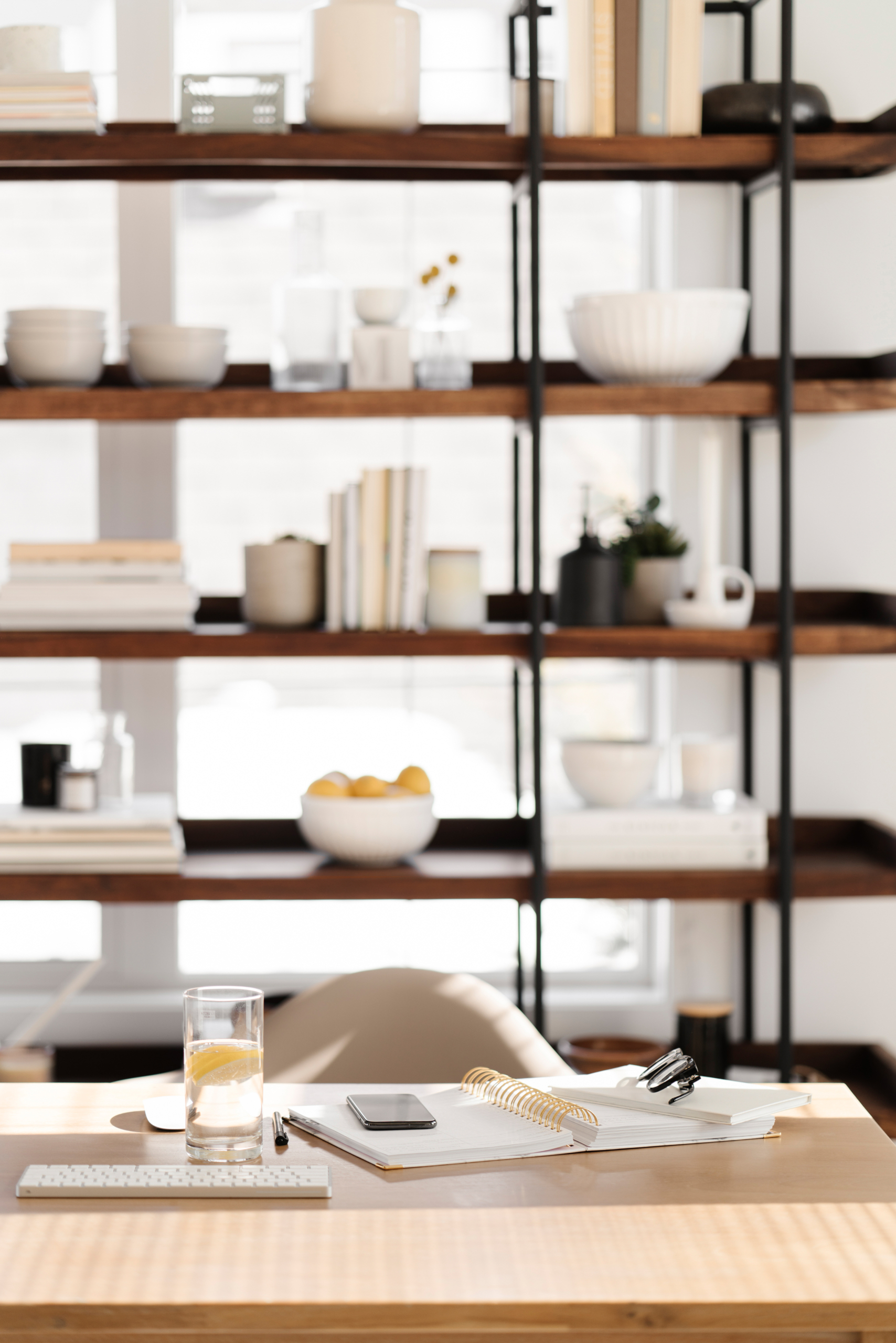 kitchen bookcase with dishes on it