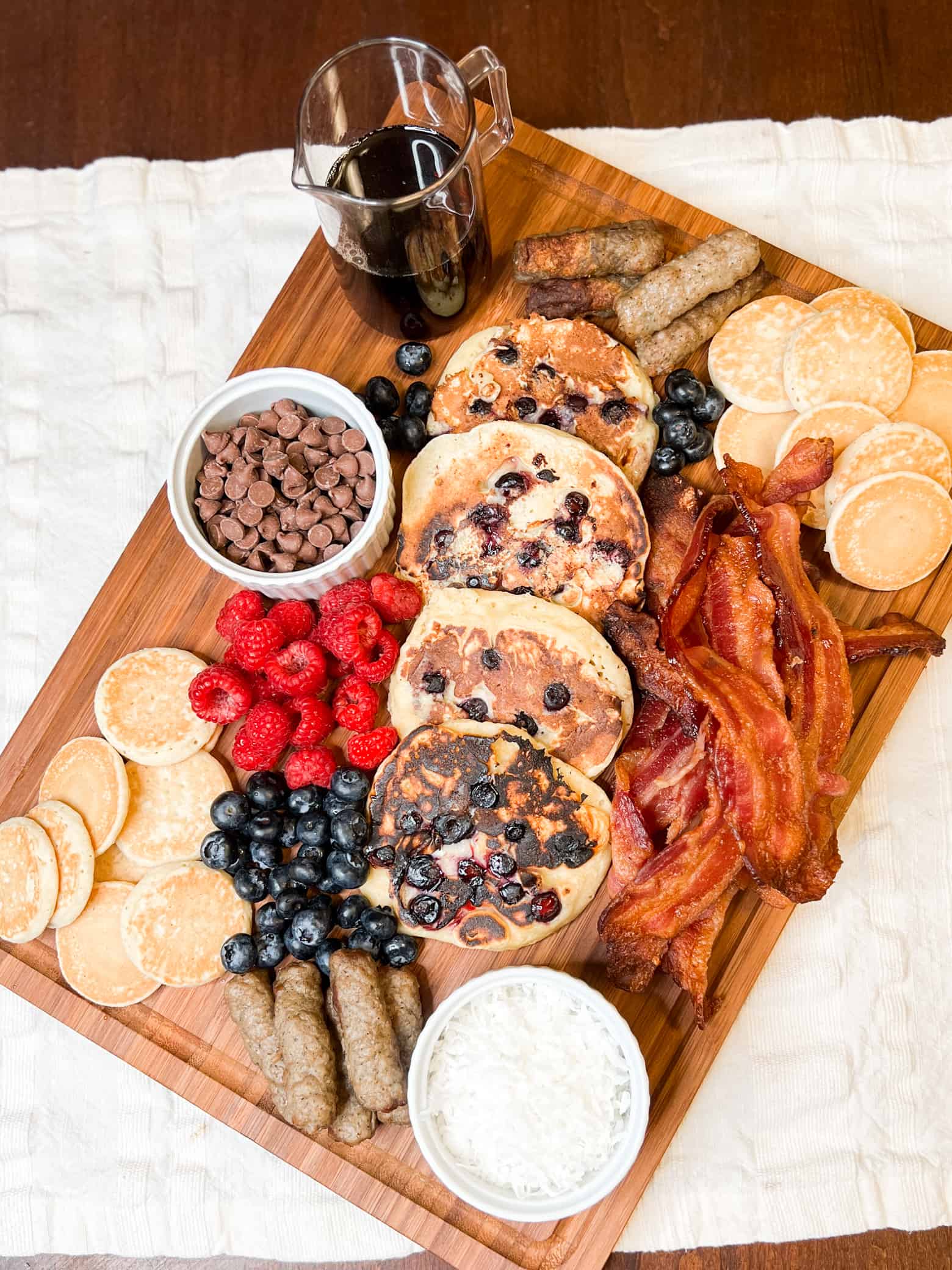 Overhead viewof a breakfast items on a cutting board