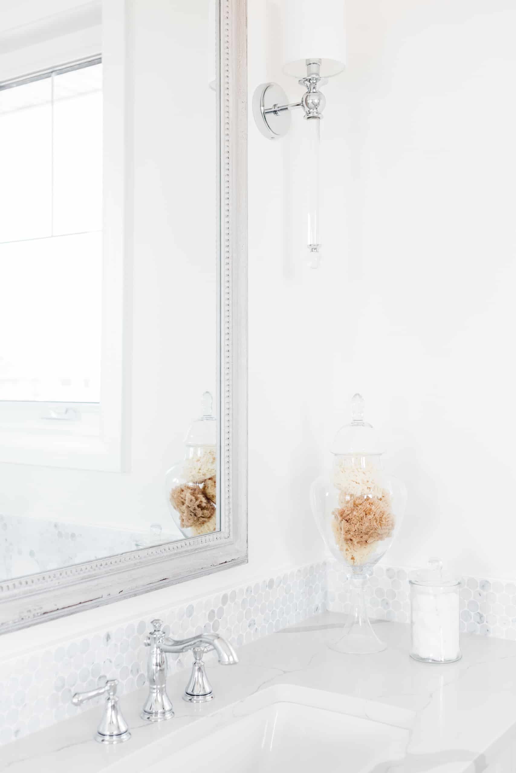 clean bathroom counter with storage containers