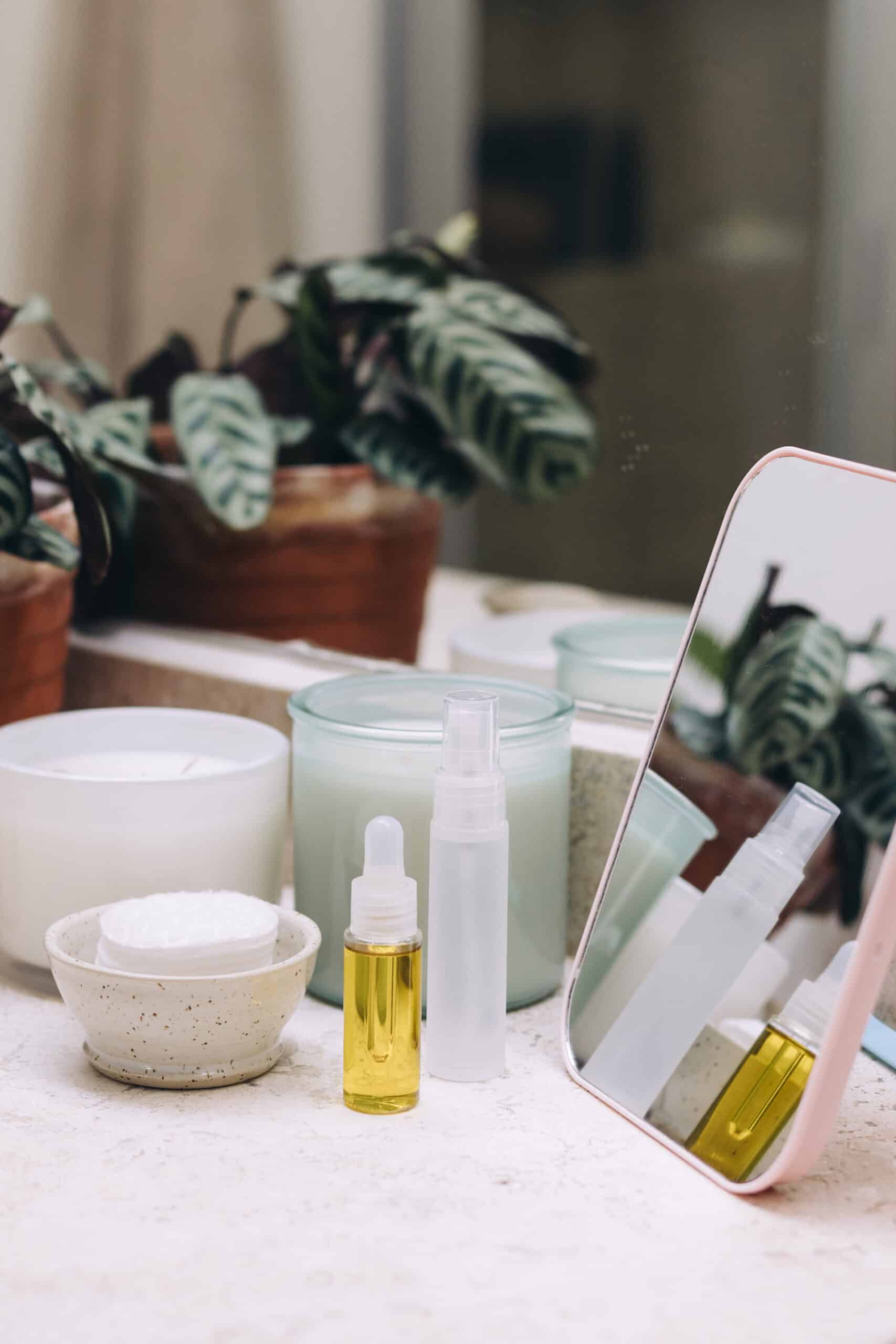 bathroom vanity filled with luxury beauty products