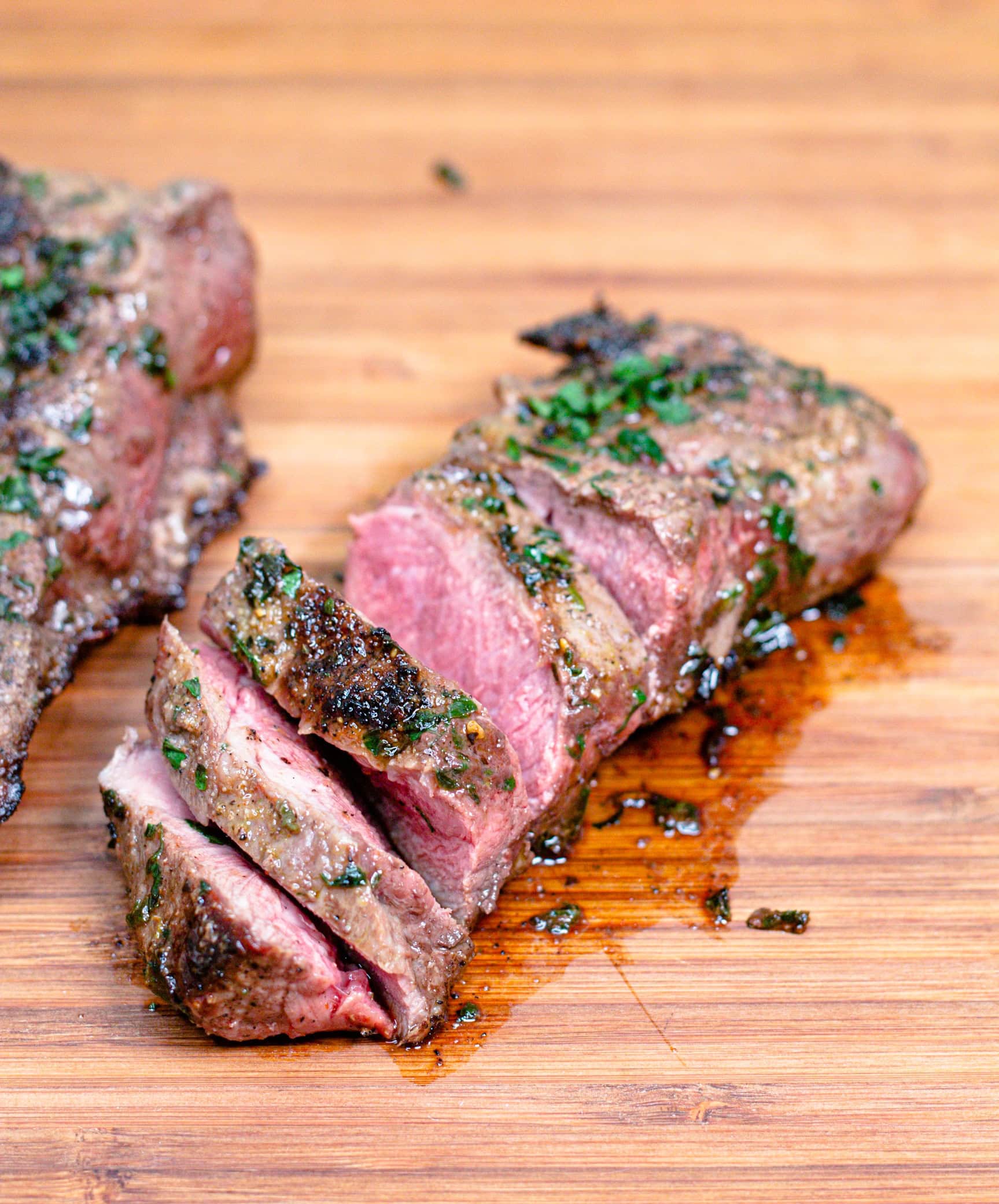 overhead close up of a sliced, cooked flat iron steak