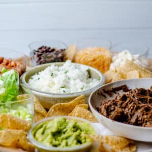 beef barbacoa board with toppings