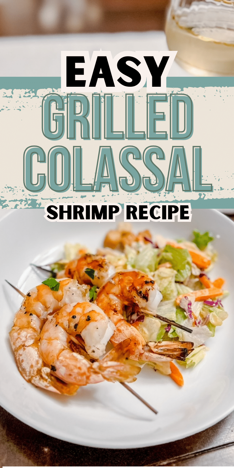 Grilled shrimp skewers surrounded by a sprinkling of parsley lie on a white plate with some coleslaw on the side.