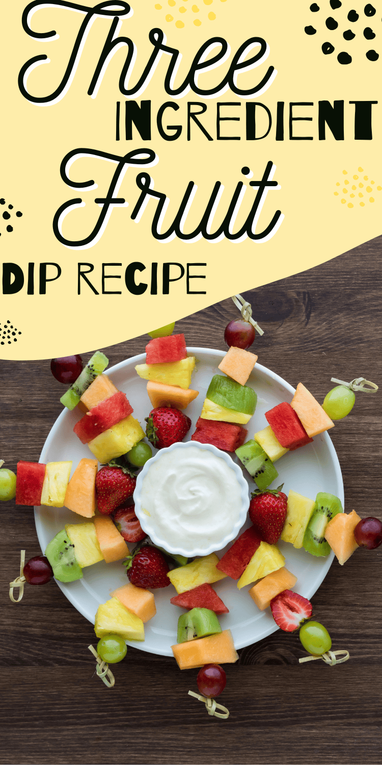 A Pinterest pin with a vibrant display of a circular fruit platter featuring skewers of fresh fruit and a bowl of Greek yogurt dip in the center, with the text "Three Ingredient Fruit Dip Recipe" in bold yellow and black typography.