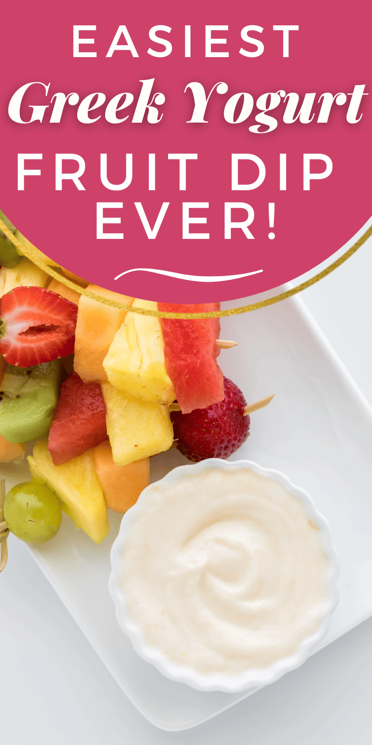 A close-up of fruit skewers featuring pineapple, watermelon, and strawberries with a bowl of Greek yogurt dip, accompanied by the text "Easiest Greek Yogurt Fruit Dip Ever!" in pink and white.