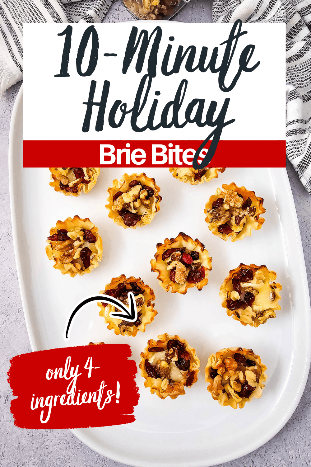 A white tray holds several mini Brie bites topped with nuts and dried fruit. Text above reads โ10-Minute Holiday Brie Bites,โ and a graphic in the corner says โonly 4 ingredients!โ with a festive, holiday-themed design.