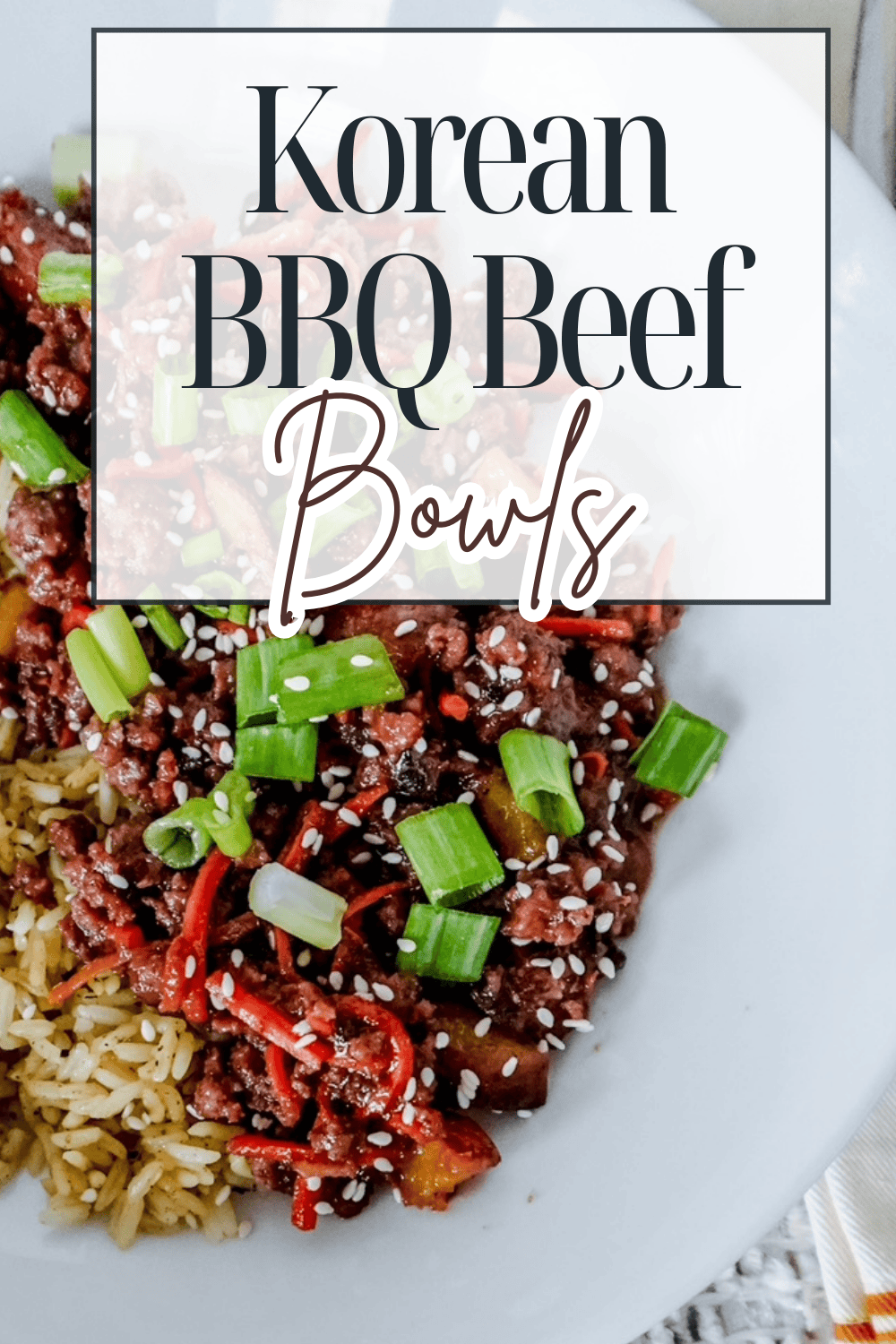 A close-up of a Korean BBQ beef bowl with ground beef, sliced green onions, shredded carrots, and sesame seeds served over rice. Large text overlay reads “Korean BBQ Beef Bowls.”.