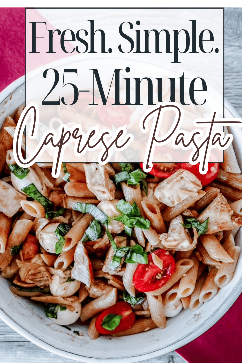 A bowl of penne pasta mixed with cherry tomatoes, mozzarella, and fresh basil sits under text that reads “Fresh. Simple. 25-Minute Caprese Pasta” on a rustic wooden surface.