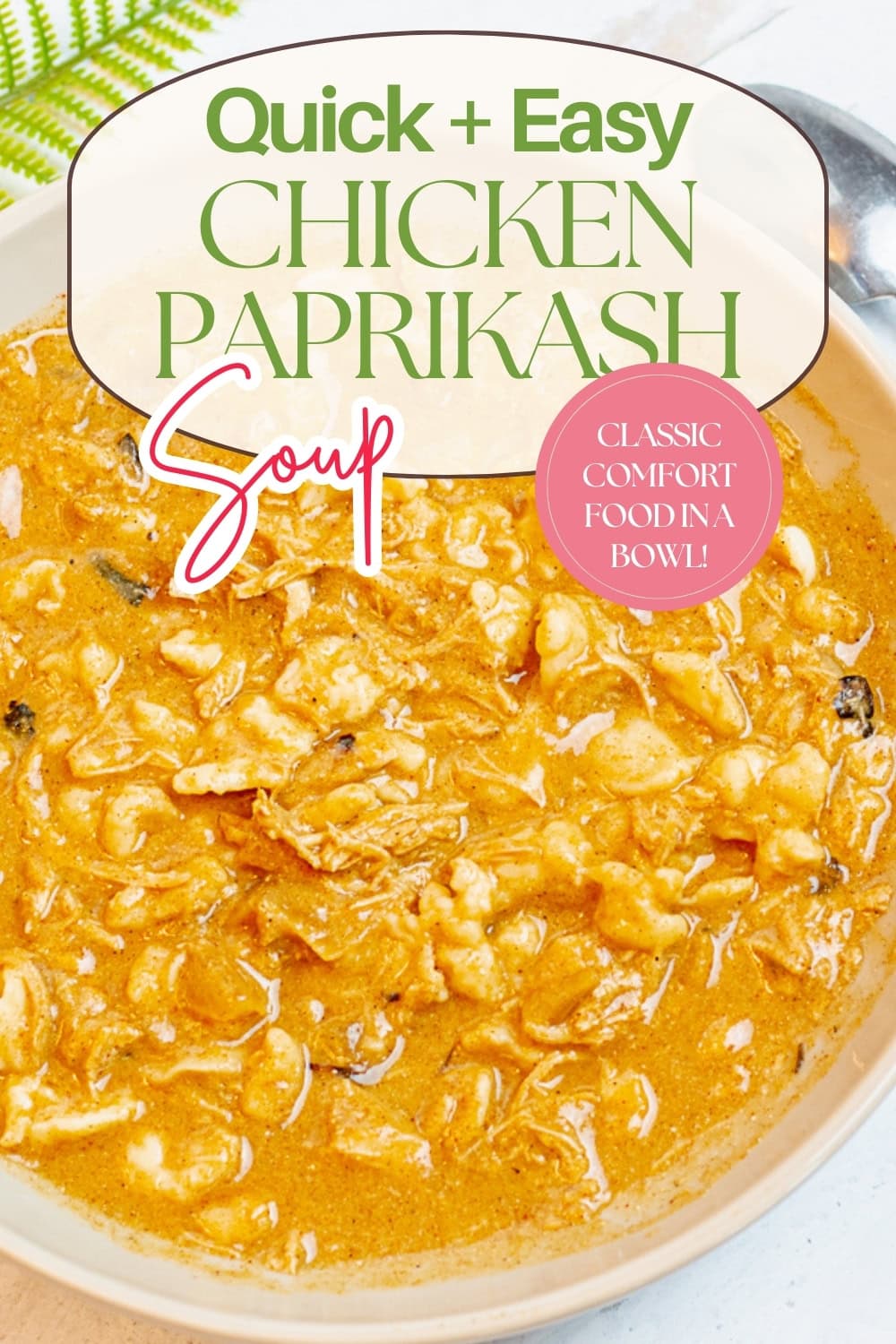 A bowl of creamy orange chicken paprikash soup with shredded chicken, placed near a green-striped napkin. Text overlay reads: Quick + Easy Chicken Paprikash Soup. Classic comfort food in a bowl!.