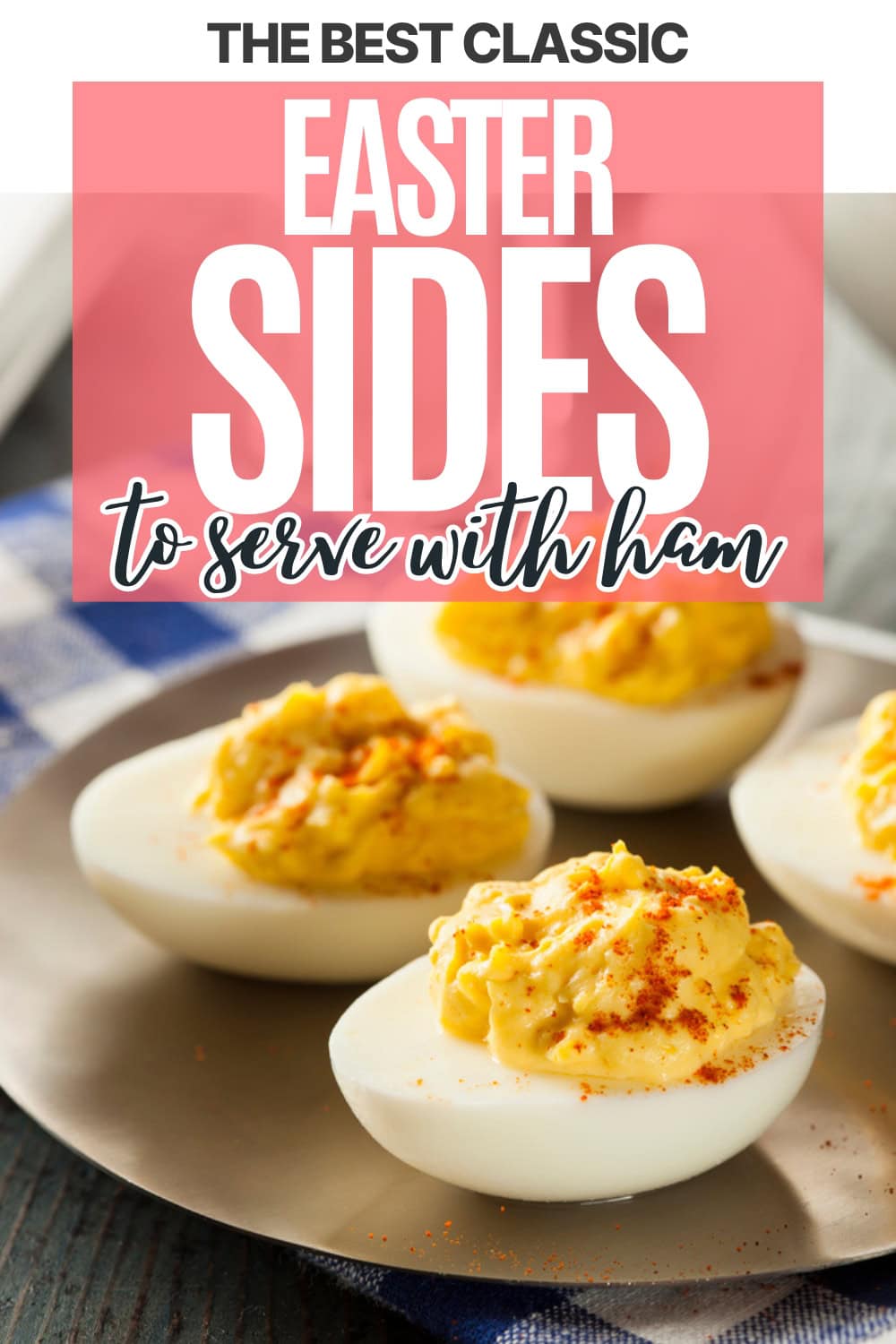 A plate of classic deviled eggs is shown close up, topped with paprika, on a table with a blue checked napkin. Text on the image reads: The Best Classic Easter Sides to serve with ham.