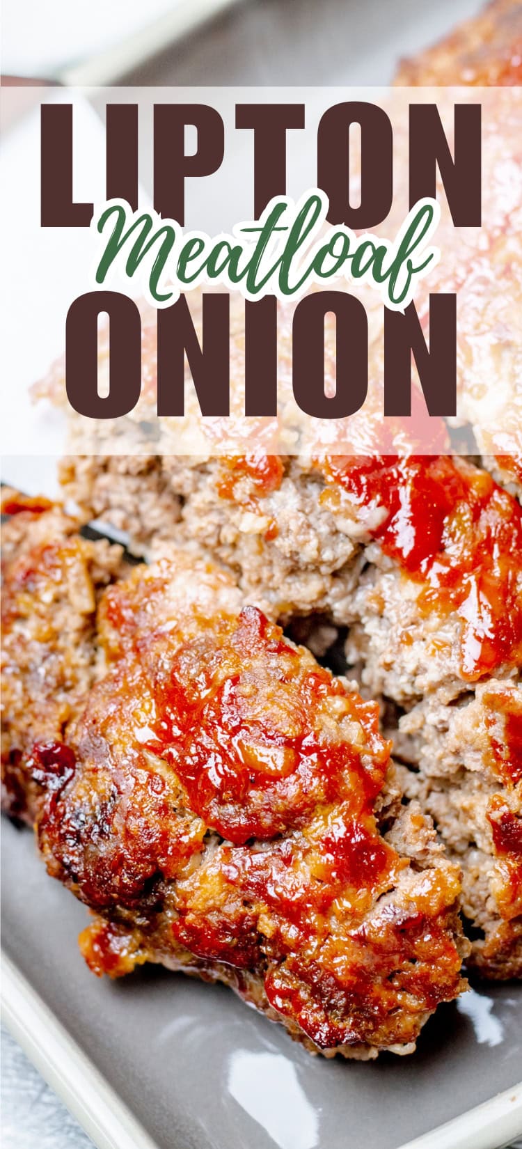 Close-up of slices of meatloaf topped with ketchup on a gray plate, with text above reading Lipton Onion Meatloaf in bold and cursive fonts.