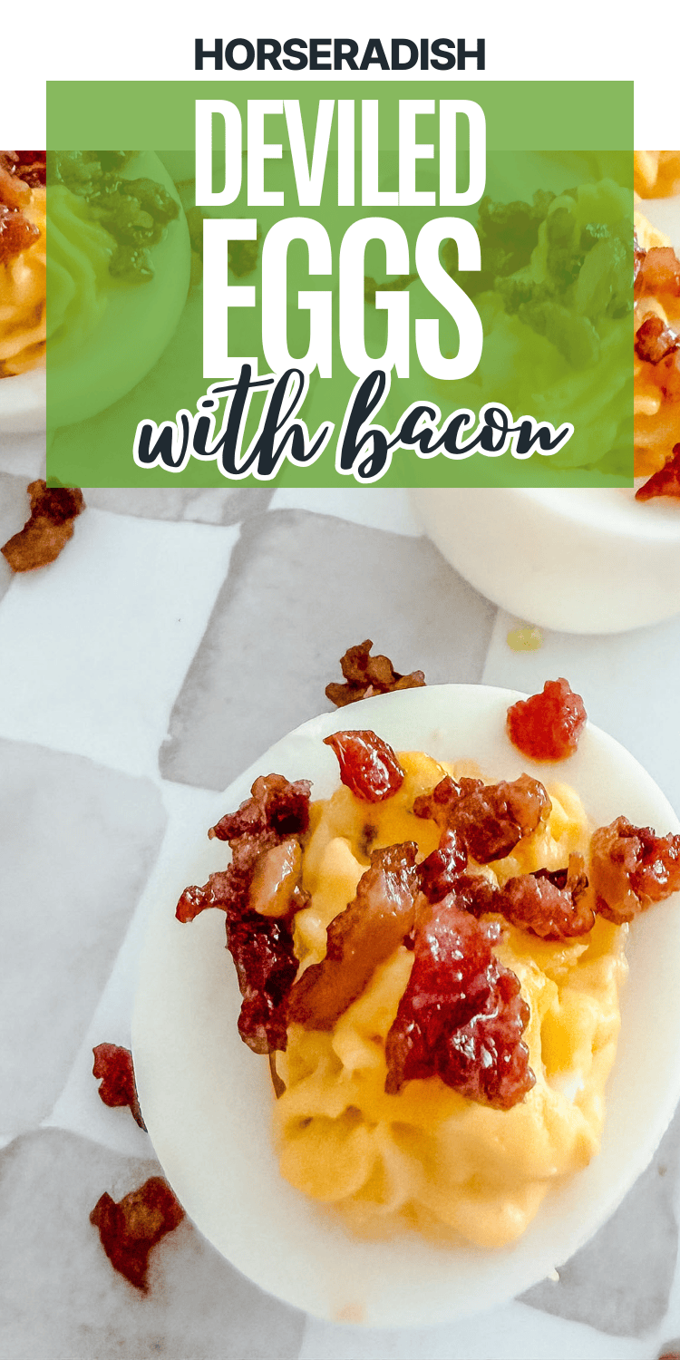 Close-up of deviled eggs topped with crispy bacon bits on a white tiled surface. Text overlay reads: “Horseradish Deviled Eggs with bacon.”.