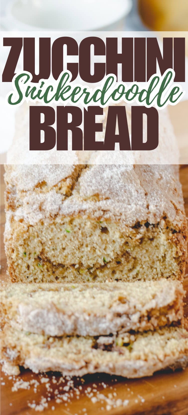 Close-up of a loaf of zucchini snickerdoodle bread on a wooden surface, with two slices cut. The top of the image features bold text reading “Zucchini Snickerdoodle Bread.”.